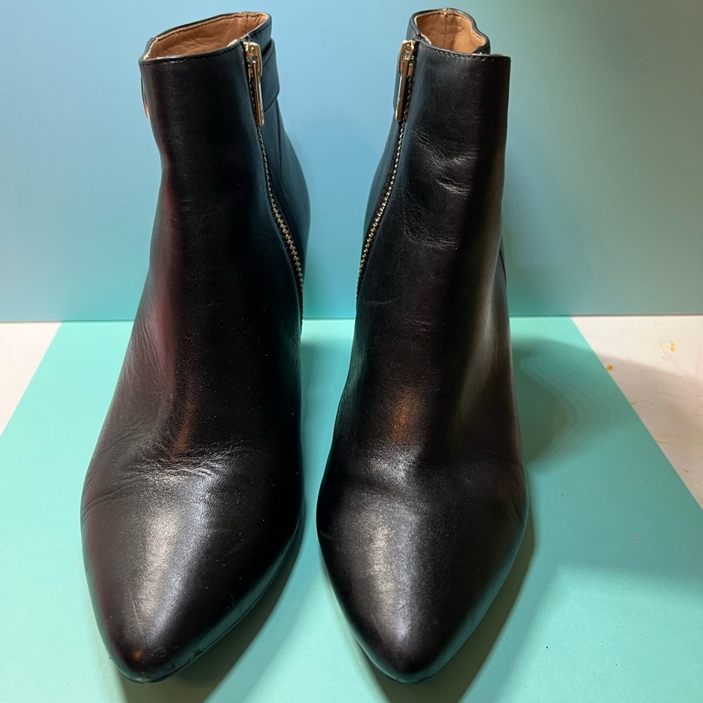 CK zip up booties gold trim